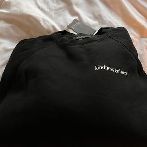 Brand new brunette the label M/L black crew neck